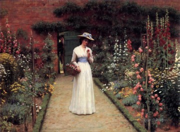 Dama en un jardín Regencia histórica Edmund Leighton Impresionismo Flores Pinturas al óleo